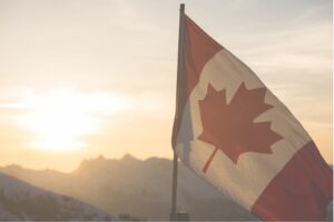 Canadian flag in the mountains