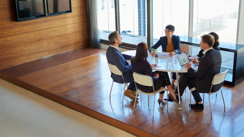 group of people working together in an office space
