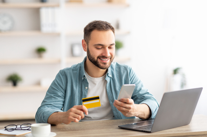 man reviewing credit card statement