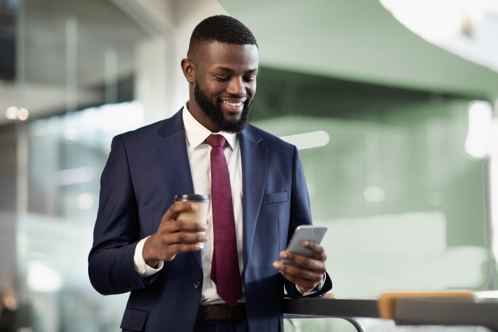 Guy holding phone